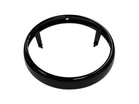Steel motorcycle headlight bezel with electrocoating and black wet paint (95% gloss).